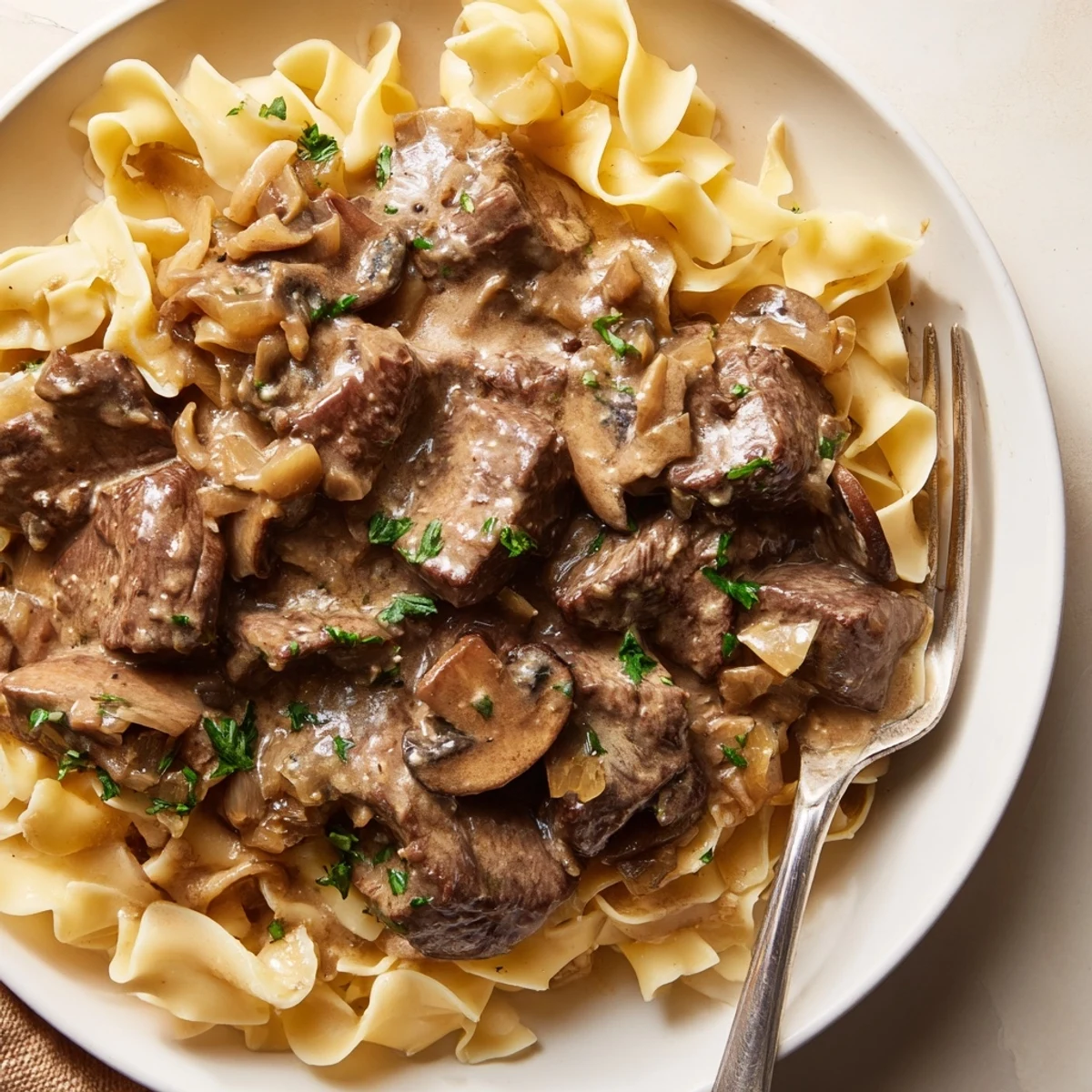 Hearty Classic Beef Stroganoff showcasing flavorful beef in a luscious mushroom sauce.