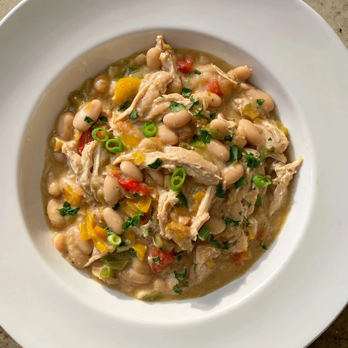 Creamy White Chicken Chili with beans, a hearty and flavorful American Southwestern main dish.