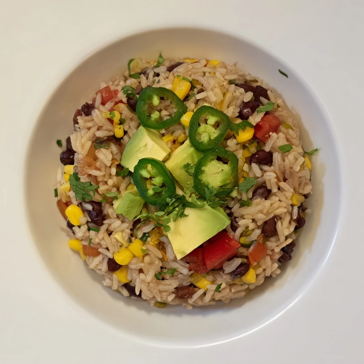 Steaming one-pot Mexican rice & beans, a colorful and flavorful main dish, ready to eat.