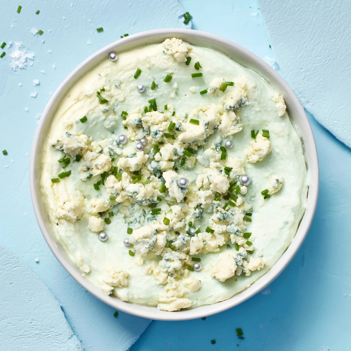 Delicious Frozen Pond Blue Dip Platter: creamy blue cheese dip glistening with edible glitter on a platter.
