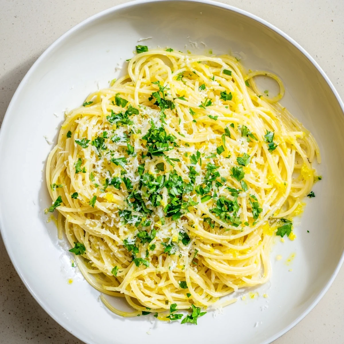 Steamy Lemon Butter Pasta Light twirled on a fork, showing glossy lemon-butter coating and fresh zest.