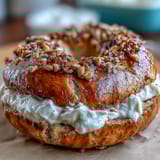 Wholesome honey whole wheat protein bagels with a fluffy yogurt dip, perfect for a nourishing breakfast or snack.  
