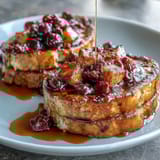 Lemon blueberry sourdough French toast bake, topped with cinnamon sugar and baked to golden perfection.  