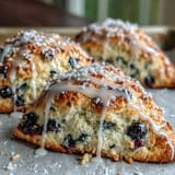 Bakery-style Lemon Blueberry Scones, tender texture with a bright lemon zest and juicy fruit.