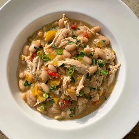 Creamy White Chicken Chili with beans, a hearty and flavorful American Southwestern main dish.