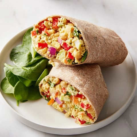 A close-up of colorful chickpea salad wraps ready for a healthy and satisfying lunch.