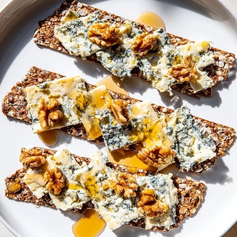 A visual display of the Blue Ridge Mountains, a cheese platter with blue cheeses and crackers.