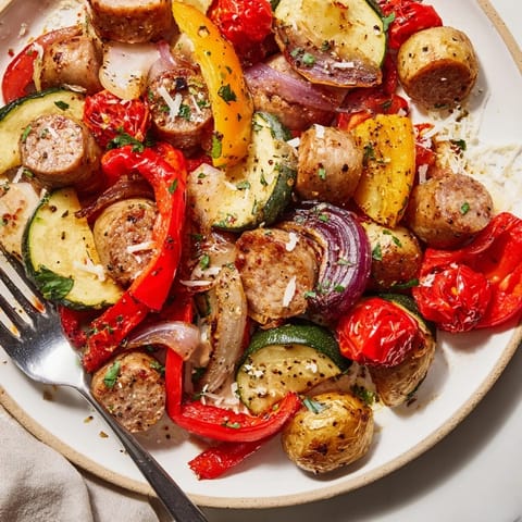 Roasted sausage and veggies in vibrant colors, perfect for a weeknight meal.  