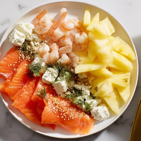 Wave Rider Surfer Snack Board featuring smoked salmon and colorful fruits, perfect for summer gatherings.