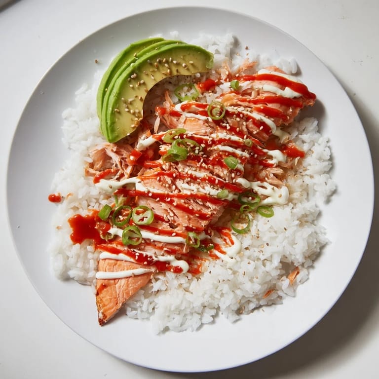 Savory Classic Salmon Rice bowl, ready to enjoy with nori—perfect for a satisfying, pescatarian weeknight dinner.